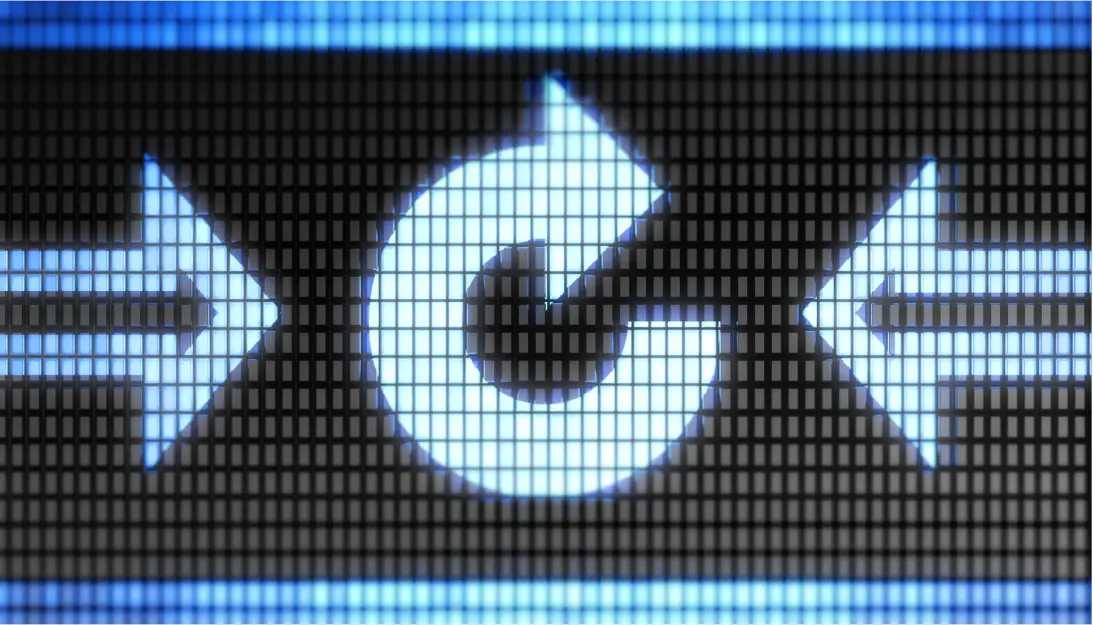 A close up of a display that show a round reload button with two arrows on each side pointing to the reload button